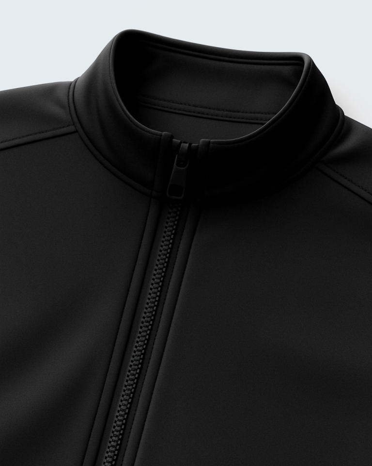 flat lay of a light gray softshell jacket on a clean white background. sleeves extended zippers visible minimal shadows top down view high clarity no logo. 1 768x960