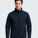 flat lay of a navy softshell jacket on a clean white background. sleeves extended zippers visible minimal shadows top down view high clarity no logo